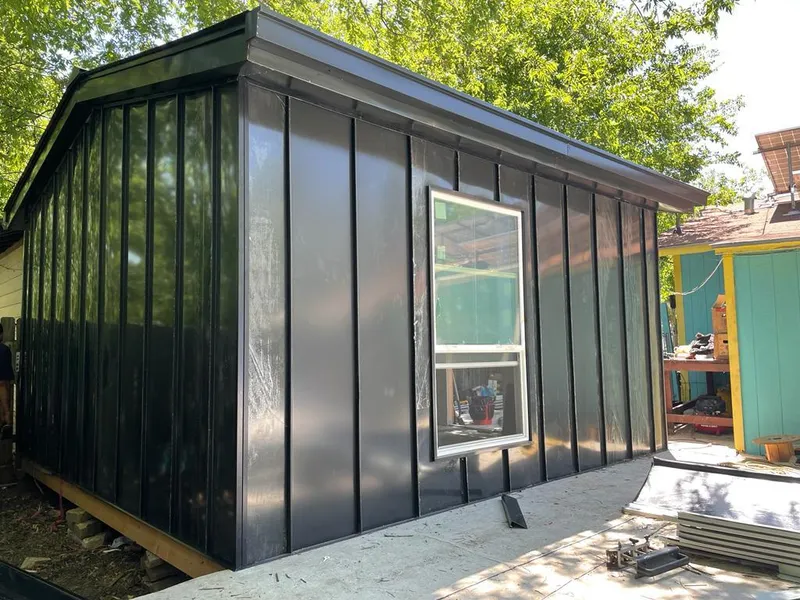 Black standing seam metal wall panels for Metal Roof Installation in Channelview