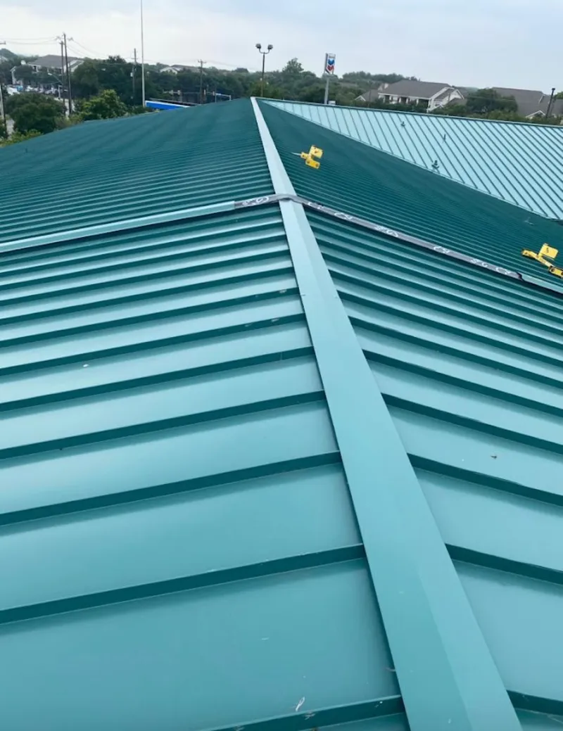 Green commercial metal roof ridge and valley for Metal Roof Repair in Channelview
